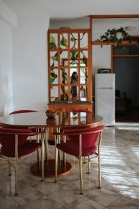 a dining room with a table and chairs at House Diminić in Labin