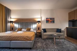 Posteľ alebo postele v izbe v ubytovaní Apartmán Drahokam Bešeňová