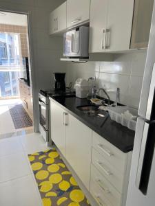 Apartamento pé na areia tesisinde mutfak veya mini mutfak