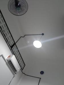 a ceiling with a fan and a light on it at Lavendrata I in Phnom Penh +50 photos