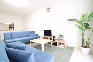 TV a/nebo společenská místnost v ubytování 札幌市にある１０人宿泊可能物件
