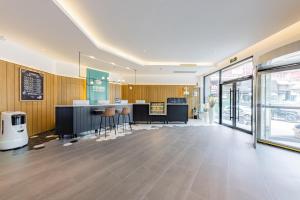 Eldhús eða eldhúskrókur á 银座精宿酒店 - 济南泺源大街泉城广场宽厚里店