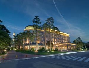 a rendering of a building at night at Mayfield Hotel Seoul in Seoul