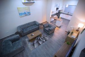 Posezení v ubytování Maple Homes