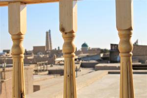 a view of a city from a balcony at Grand Vizir Hotel in Khiva