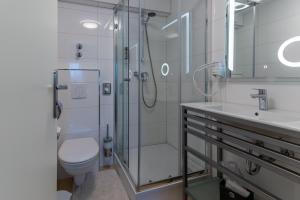 Koupelna v ubytování Hotel Myrsini