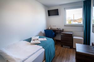 Postel nebo postele na pokoji v ubytování Hotel Myrsini