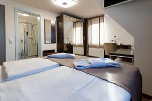 Postel nebo postele na pokoji v ubytování Hotel Myrsini