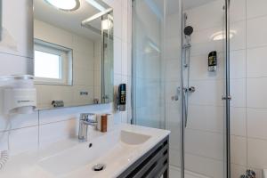 Koupelna v ubytování Hotel Myrsini