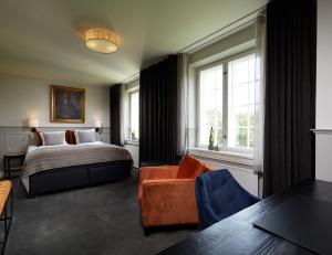 Postel nebo postele na pokoji v ubytování Gl. Avernæs Sinatur Hotel & Konference