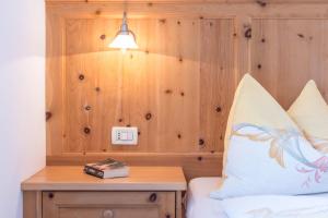 Postel nebo postele na pokoji v ubytování Schildberghof Santner
