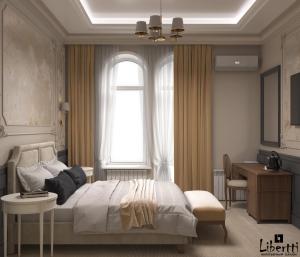 een slaapkamer met een bed, een bureau en een raam bij Boutique-Hotel Simfonia in Kislovodsk