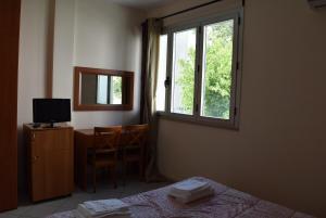 Postel nebo postele na pokoji v ubytování La Dea