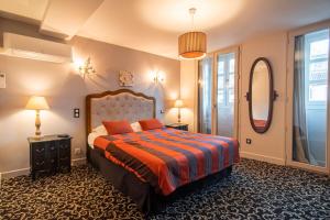 Postel nebo postele na pokoji v ubytování Hôtel Itzalpea