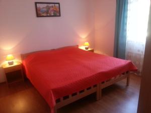 Postel nebo postele na pokoji v ubytování Apartments Maikidan