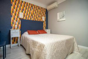 Postel nebo postele na pokoji v ubytování Hôtel Itzalpea