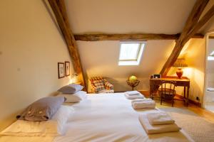 Ліжко або ліжка в номері Domaine Maison Dodo