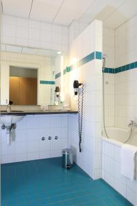 Bilik mandi di Hotel Banana City Winterthur