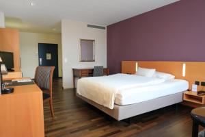 Katil atau katil-katil dalam bilik di Hotel Banana City Winterthur