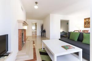 Zona d'estar a Lisbon Flower 360º - Your Lovely Flat with Pool and Parking