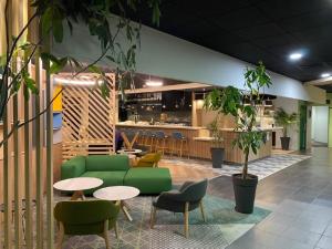 พื้นที่นั่งเล่นของ Holiday Inn Clermont Ferrand Centre by IHG
