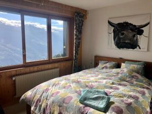 Ein Bett oder Betten in einem Zimmer der Unterkunft Immeuble Les Aiglons