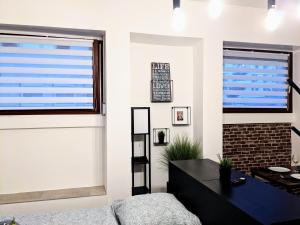 Posezení v ubytování LENASTAY I Loft Chick - Innenstadt + 7 fotografií