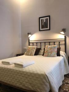 Posteľ alebo postele v izbe v ubytovaní Casa Consell Bailen, Guest House