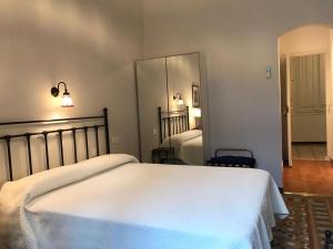 Posteľ alebo postele v izbe v ubytovaní Casa Consell Bailen, Guest House