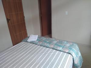 Postel nebo postele na pokoji v ubytování Pousada Emanuell