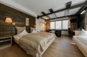 Voodi või voodid majutusasutuse Relais Bayard toas