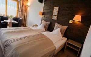 Voodi või voodid majutusasutuse Relais Bayard toas