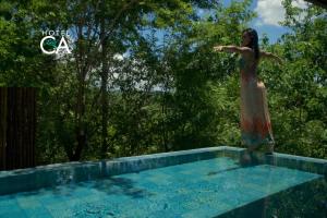 A piscina localizada em Hotel Canto das Águas - Roteiro de Charme ou nos arredores