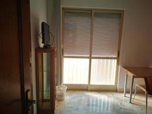 TV a/nebo společenská místnost v ubytování Habitación piso compartido Alquiler por temporada NO Turistico + 6 fotografií