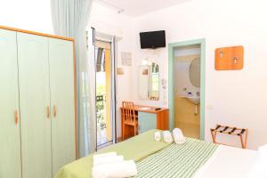 Postel nebo postele na pokoji v ubytování Hotel Caravel B&B