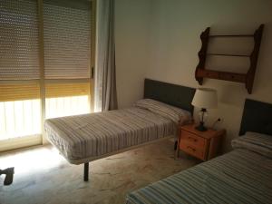 Postel nebo postele na pokoji v ubytování Habitación piso compartido Alquiler por temporada NO Turistico