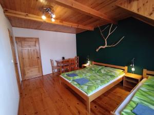 Postel nebo postele na pokoji v ubytování Jurajska Chata