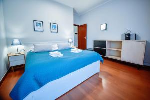 Posteľ alebo postele v izbe v ubytovaní Apartamenty na Wyspie - Baltic Park 3.0.7 - Apartament z 2 sypialniami i 80 m² tarasem