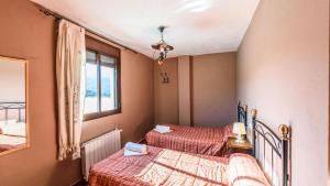 Postel nebo postele na pokoji v ubytování Casa La Mina Benaoján by Ruralidays