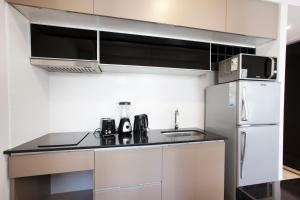 Kjøkken eller kjøkkenkrok på Le Montreal Apartments