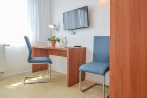 TV/trung tâm giải trí tại Gästehaus abz Stuttgart