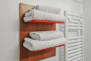 Giường trong phòng chung tại Gästehaus abz Stuttgart