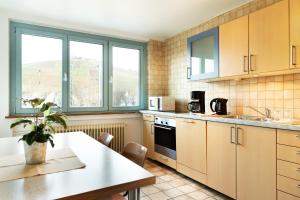 Nhà bếp/bếp nhỏ tại Gästehaus abz Stuttgart