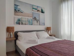 Łóżko lub łóżka w pokoju w obiekcie SURF apARTs by RB
