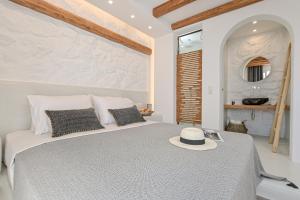 A bed or beds in a room at Naxos Blue Sky