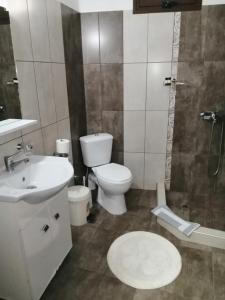 Ванная комната в Guesthouse Athanasiou