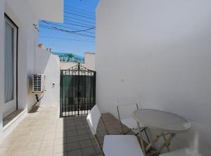 Un balcón o terraza de La Platgeta · La Platgeta · Ideal family apartment, with private terrace