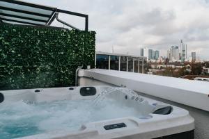 a bath tub on the roof of a building at The Blasky in Frankfurt/Main