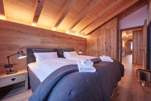 Vuode tai vuoteita majoituspaikassa Attico Grindelwald