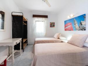 Posteľ alebo postele v izbe v ubytovaní Casa paloma